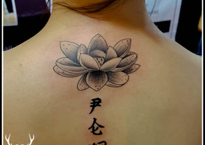 Lotus back Chinese font tattoo